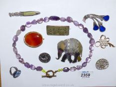 A quantity of jewellery including amethyst coloured cut and faceted bead necklace,