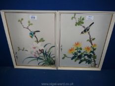 A pair of oriental paintings on silk of birds perched on branches, both signed by the same artist.