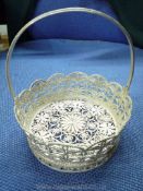 A beautifully made, intricate filigree Silver Basket depicting trailing stems,