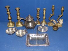 A quantity of metalware including teapot, candlesticks, bowl with horse shaped handle, etc.