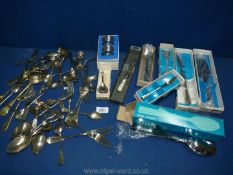 A quantity of miscellaneous cutlery including pastry forks, salad servers, napkin rings,