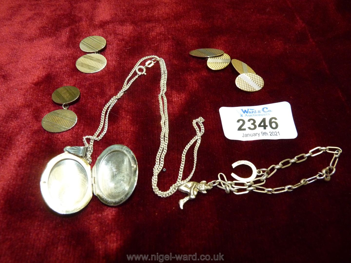 Miscellaneous silver items including child's silver charm bracelet, locket and chain,