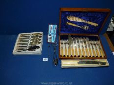 A cased set of Fish eaters and servers and a Viners boxed set of cutlery.