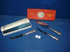 A Silver handled cheese knife, Sheffield hallmark and a silver handled cake Slice,