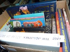 A box of books including Atlas,