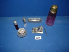 A cranberry glass, silver topped Perfume Bottle, cranberry glass sifter, white metal notepad, etc.