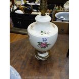 A Wedgwood table lamp with floral and butterfly decoration. 12 1/2" tall.