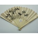 A Japanese painted silk Fan with signatures and red seal marks, the sticks inlaid with coral,