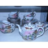 A part Japanese Teaset with hand-painted decoration of blossom tree with two ladies to include a