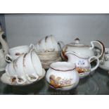 A Royal Stuart part teaset with six cups and saucers, six tea plates,