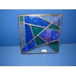A modern square stained glass window, 12 3/4'' square.