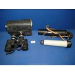 A cased pair of Chinon Zoom 7-15 x 35 field binoculars 5.7 at 7 x and 3.