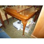 A Mahogany draw-leaf Dining Table standing on elegant cabriole legs,