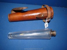 A leather Colonial Saddle Case with a vintage glass flask with silver top, Birmingham 1932,