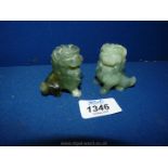 A pair of green stone Lions, 2'' tall.