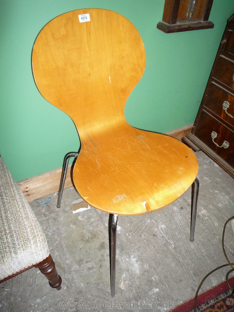 A laminated/bent-wood seated and backed ''Keeler'' type Chair having chromium plated legs,
