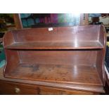 A Mahogany and Oak hanging shelf or table top Shelf unit, 34 3/8'' wide x 11'' deep (max.