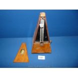 A metronome, 9'' tall.