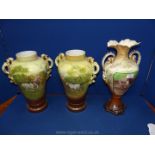 A pair of large two handled urn vases decorated with horses, calves and chickens,