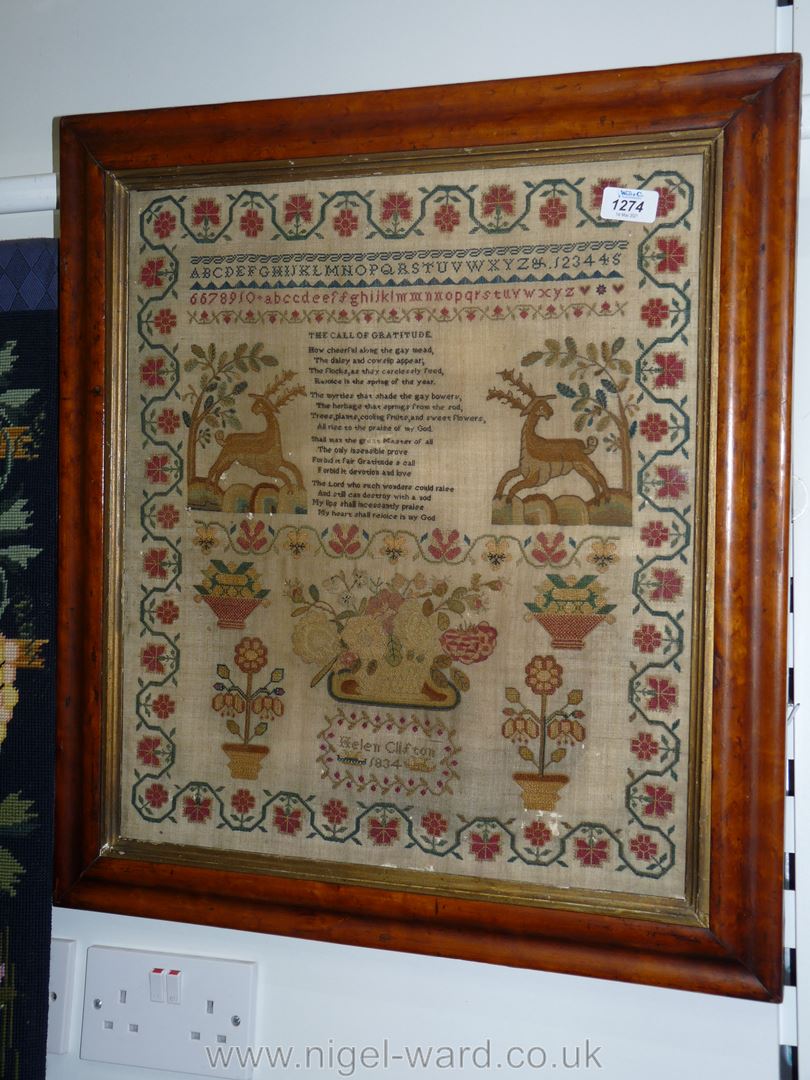 A good Georgian finely worked Sampler featuring floral border,