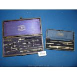 A cased draughtsman set by G. Thornton and a smaller cased drawing set.