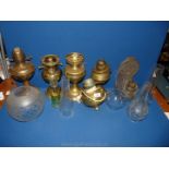 A box of old oil lamps and spare chimneys.