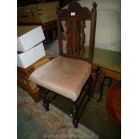 A 1930/40's Oak framed Hall side Chair having five splat back with a shell pediment,