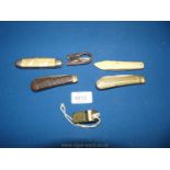 Two Lamb Foot penknives, a bone handled penknife, Thunderer whistle,