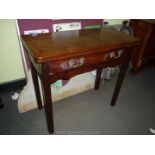 A Georgian circa 1770's Mahogany swing leg Tea Table standing on chamfered grooved legs with full