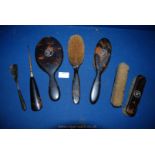 A quantity of Tortoiseshell monogrammed with 'W' including mirror, two brushes, shoe horn,