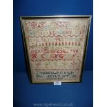 A small framed Georgian Sampler worked by Elizabeth Riley, Derby, featuring alphabet, numbers, etc.