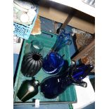 Six large coloured glass vases including blue,