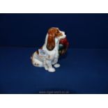 A Royal Doulton Spaniel with pheasant in mouth, 5 1/2" tall.