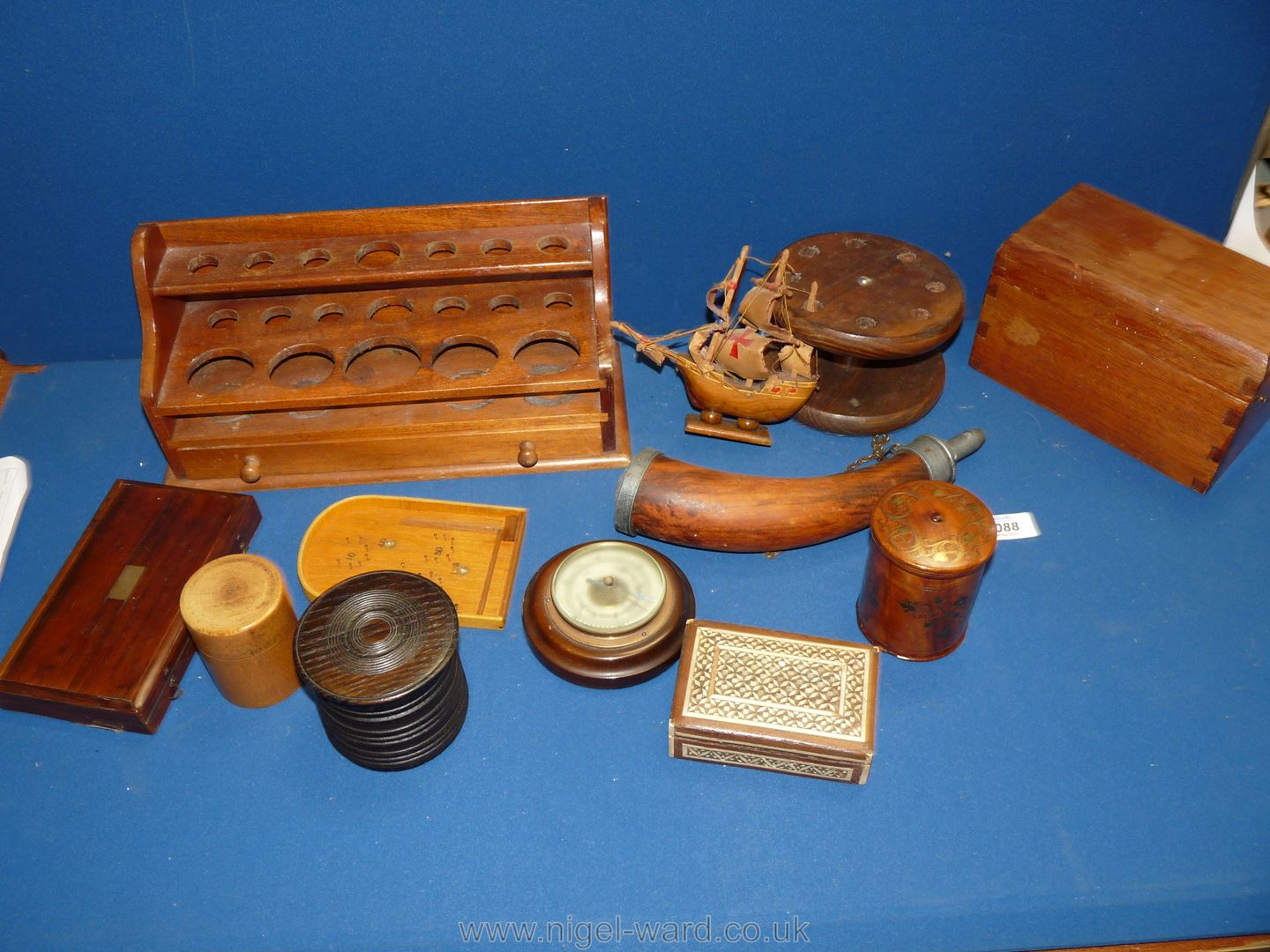 A quantity of Treen including sample stand, pen stand, powder horn, barometer, lidded boxes,