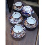 An early Derby part tea set, decorated in the imari taste,