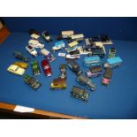 A collection of 30 model vehicles, mainly trucks and vans including Corgi, Matchbox,