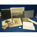 A quantity of old empty photo albums, black and white photographs,