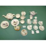 A box of well played with dolls house china