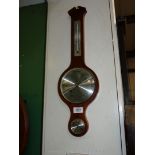 A Mahogany framed Aneroid Banjo Barometer/Thermometer/ Hydrometer by ''Moco, England'',