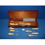 A darkwood Box, 19 3/8'' long of lino cutting and carving hand Tools, some by NWT,