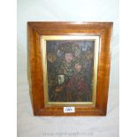A maple framed and gilded slip containing an Icon of some character,