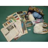 A box of hand and toilet bags, knitting bag of wool, bead decorated moccasins,