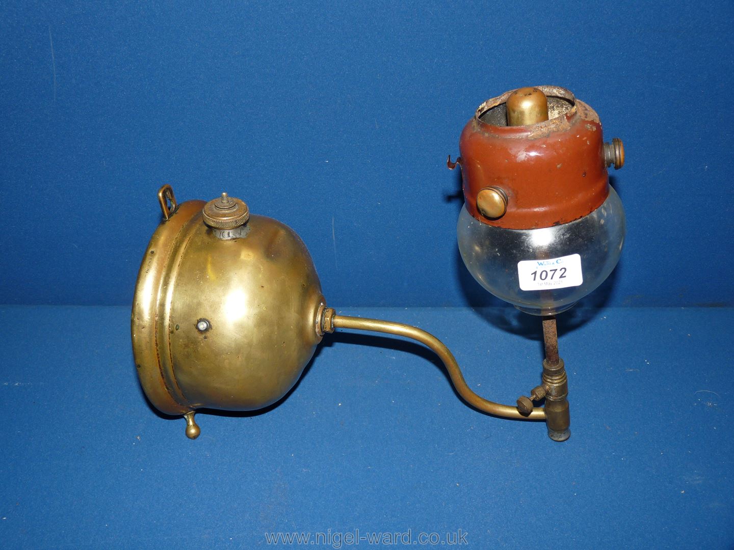 A brass wall hanging pressurised Oil Lamp possibly tilly.