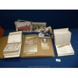 Two albums of reproduction Titanic postcards,