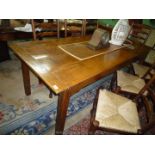 A delightfully plain Oak Refectory Table type Dining Table having four plank top with cleated ends