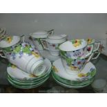 A Shore & Coggins Bell china part Teaset with floral decoration (1950's) to include eight teacups,