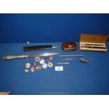 A Wyvern cased pen and pencil set, old whistle, small purse, two propelling pencils,