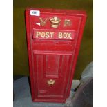 A contemporary red cast iron Letter box front marked V.R.