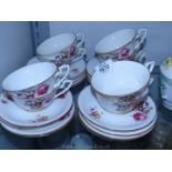 A pretty floral Royal Worcester part Teaset comprising nine cups and saucers, ten tea plates,