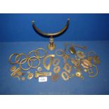 A quantity of old brass fittings escutcheons, keys, etc.